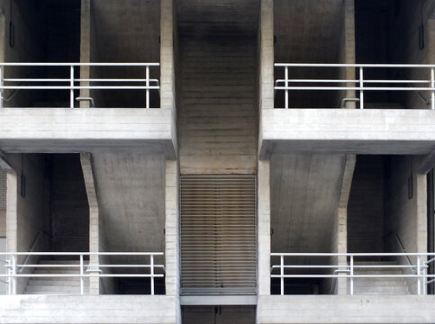 concrete staircases and walkways in an old brutalist type buildi