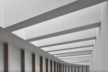 Fototapeta premium Minimal White Colonnade with Shadows, Modern Architectural Perspective