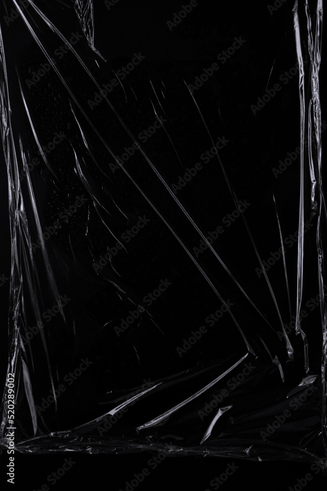 Aufkleber black transparent plastic wrap texture overlay background. realistic plastic for poster design and p
