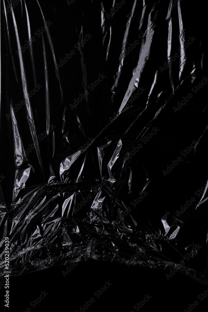 Aufkleber black transparent plastic wrap texture overlay background. realistic plastic for poster design and p