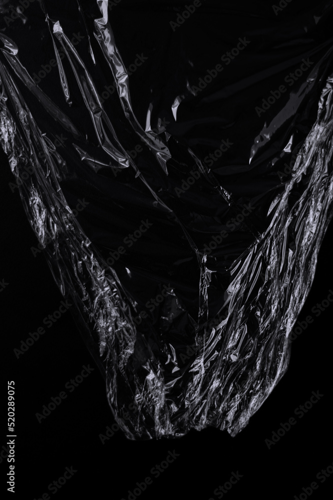 Aufkleber black transparent plastic wrap texture overlay background. realistic plastic for poster design and p
