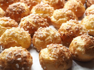 Chouquettes coated with pearl sugar