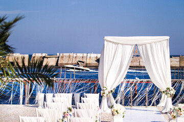 Outdoor wedding ceremony in a green garden