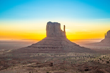 Fototapeta na wymiar sunrise at west mitten butte in the monument valley, Utah