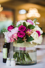 Bouquet of flowers in vase on the wedding table