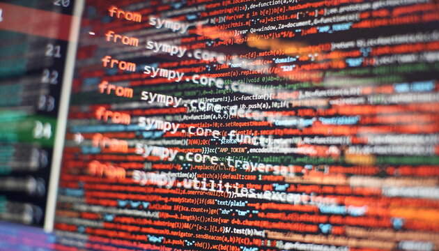 Abstract computer script code. Programming code screen of software developer. Software Programming Work Time.