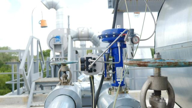Heavy industry. Chemical refinery factory inside view. Modern equipment, steel tanks and boilers with cables, pipelines and valves for chemical mixing. Production of formalin. oil industry. 4 k video