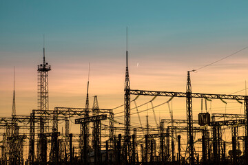 Electrical substation on the sunset or sunrise background
