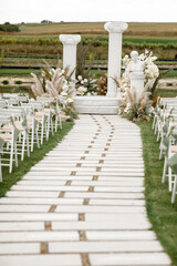 Outdoor wedding ceremony in a green garden