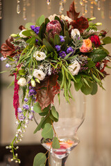 Bouquet of flowers in vase on the wedding table