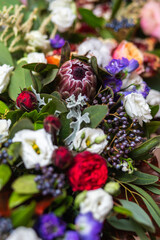 Bouquet of flowers in vase on the wedding table