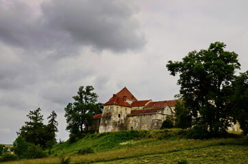 Fototapeta premium View to ancient castle in Svirzh, Ukraine .