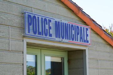 Fototapeta na wymiar Municipal police facade wall logo and text sign on entrance official building of mayor local police municipale