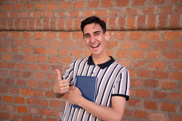 Education and entertainment. Young attractive student with a book.	Happy man. 