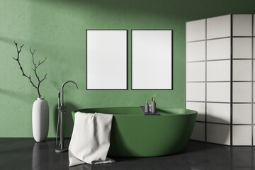 Front view on dark bathroom interior with bathtub, two posters