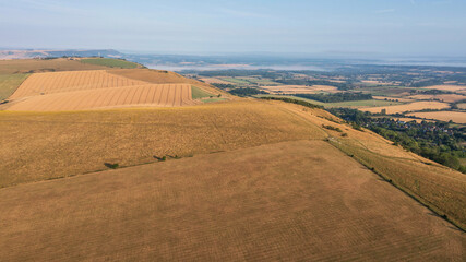 Fototapeta na wymiar Glorious aerial drone landscape image of South Downs in English countryside on Summer morning