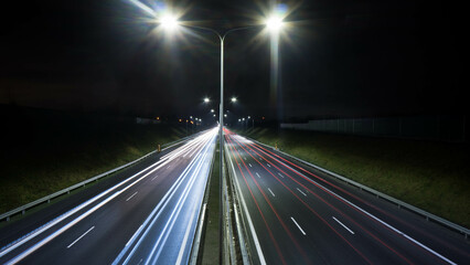 night view of the highway, light streaks, urban landscape, Poland, Poznań, street lamps
