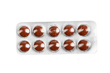 new blister with pills isolated on a white background.