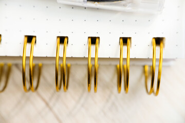 Yellow gold binder ring on the table, macro shoot