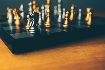 Chess board game to represent the business strategy with competition in the world market. and find out the best solution to meet target objective and goal. Sign and symbol of challenging as concept.