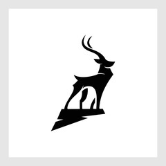 simple and elegant deer logo, silhouette of wild deer standing