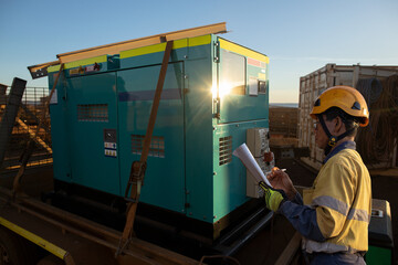 Construction worker wearing work uniform safety helmet conducting daily pre safety inspection...
