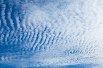 Altocumulus clouds vertically arranged