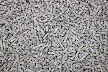 shallow depth of field photo of recycled Paper cat litter pellets