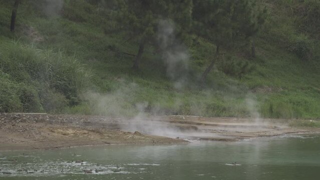Volcanic Lake Linow Tomohon, North Sulawesi, Indonesia - Green Water, Bubbling Mud Pools and Steam