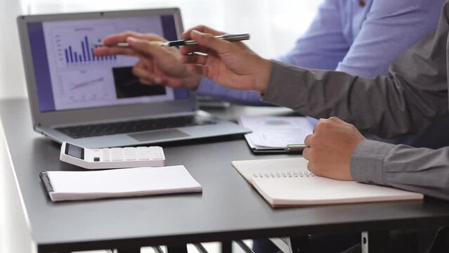 Business meeting to discuss company operating profit analysis and business investment strategy planning.