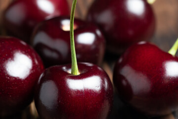 Fresh sweet cherry fruit on wooden background