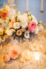 Bouquet of flowers in vase on the wedding table