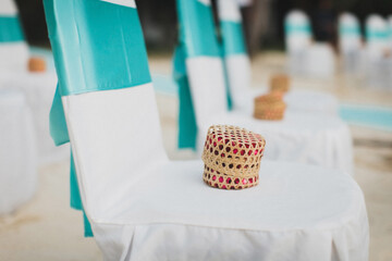 Chairs with gifts at the wedding ceremony