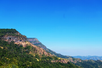 Mountain scape at Khao Kho National Park & Hot Springs in the morning at Phetchabun of Thailand in Winter, Sunny day and blue sky, Beautiful Natural View in Thailand, Natural wallpaper and background