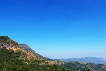 Mountain scape at Khao Kho National Park & Hot Springs in the morning at Phetchabun of Thailand in Winter, Sunny day and blue sky, Beautiful Natural View in Thailand, Natural wallpaper and background