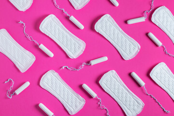 Tampons, feminine sanitary pads pattern on pink background. Hygiene care during critical days....