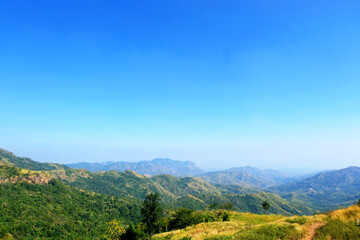 Mountain scape at Khao Kho National Park & Hot Springs in the morning at Phetchabun of Thailand in Winter, Sunny day and blue sky, Beautiful Natural View in Thailand, Natural wallpaper and background