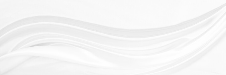 White gray satin texture that is white silver fabric silk background with beautiful soft blur pattern natural.