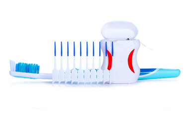 Interdental tooth brushes, toothbrush and dental floss on white background isolation
