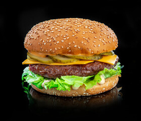 Fresh tasty burger on black background