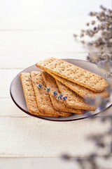 Traditional galette for breakfast, low-calorie for a healthy diet. On a white wooden background, vertical format
