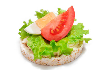 Rice Cake Sandwich with Tomato, Lettuce and Egg - Isolated on White. Easy Breakfast. Diet Food. Quick and Healthy Sandwiches. Crispbread with Tasty Filling. Healthy Dietary Snack - Isolation