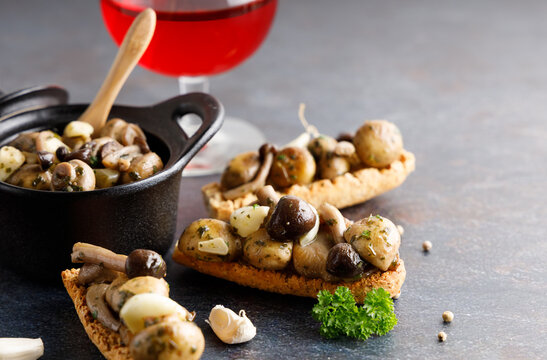 Mushrooms in garlic butter sauce. Mushrooms prepared with garlic , fresh butter and parsley served as a appetizer.