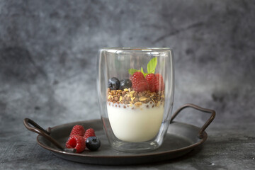 Healthy breakfast, cereal with berries and yogurt
