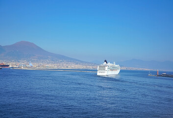 Fototapeta na wymiar Cruise ship leaving port of Naples, Italy