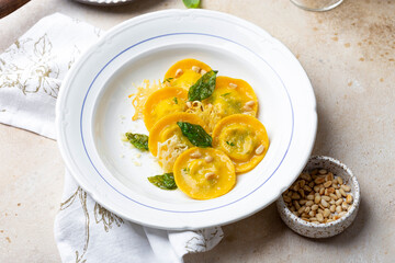 homemade ravioli stuffed with ricotta and kale