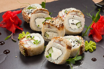 rolls with eel, cucumber and cream cheese