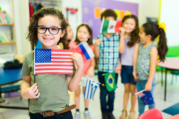 Caucasian kindergarten boy learning in preschool