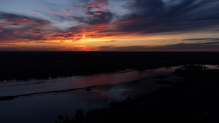 Fototapeta premium sunset over the river
