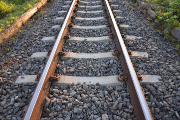 Black stone under the rails. Concept stable construction foundations.